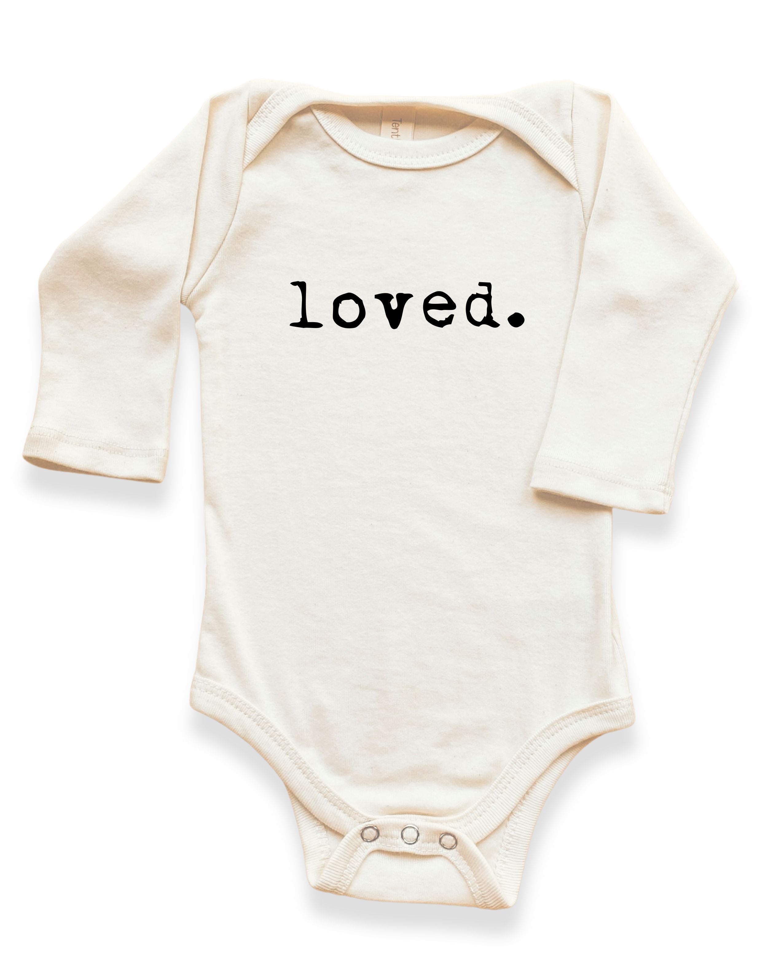 cream organic cotton baby onesie with &