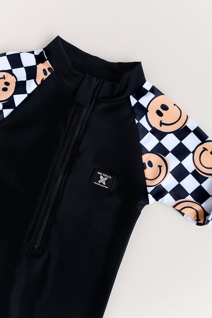 UPF 50 RASHGUARD ONESIE - HAPPY SURF