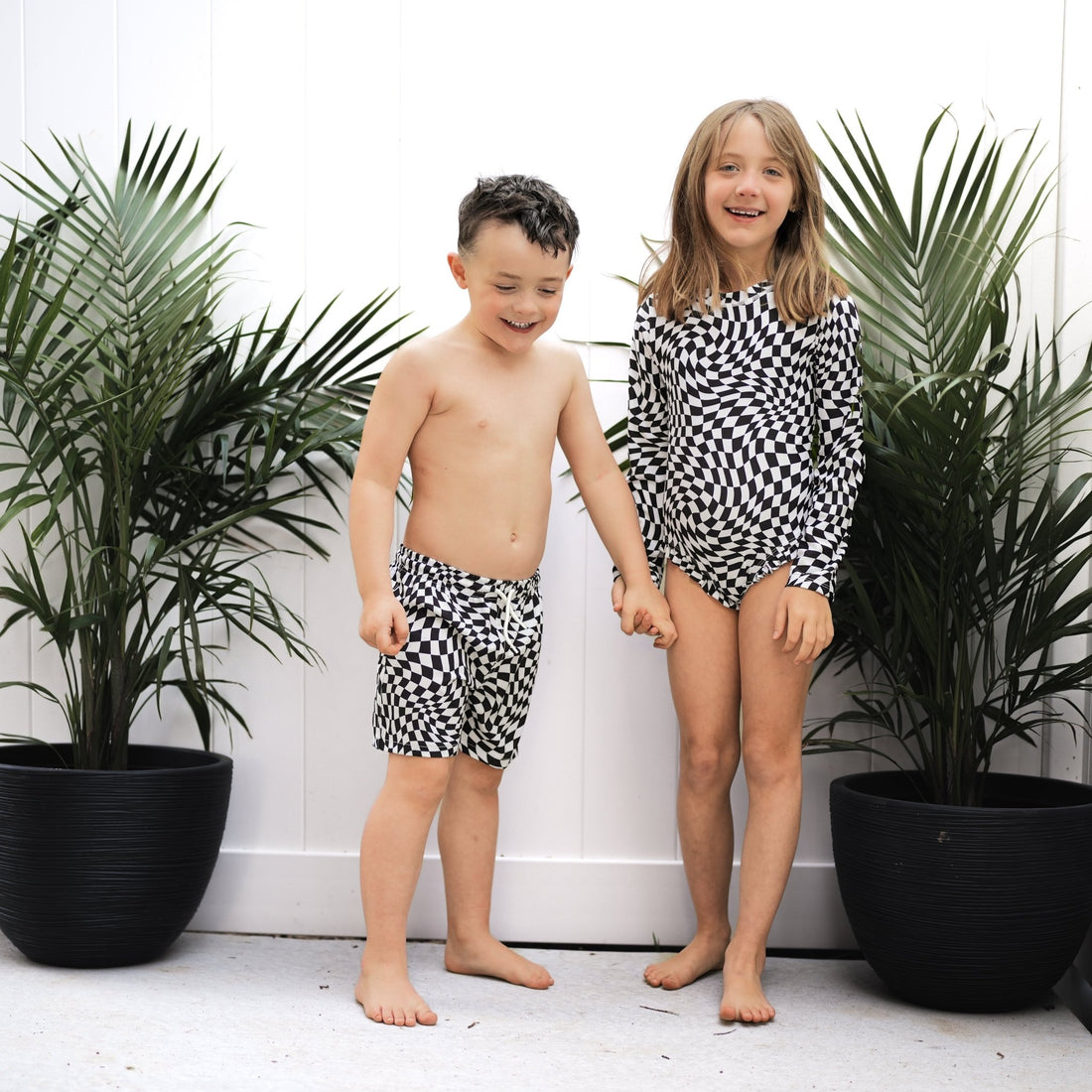 RUFFLE RASH GUARD - Black Dizzy Check - Tenth &amp; Pine - Ruffle Rash Guard - 6/12m - millie + roo