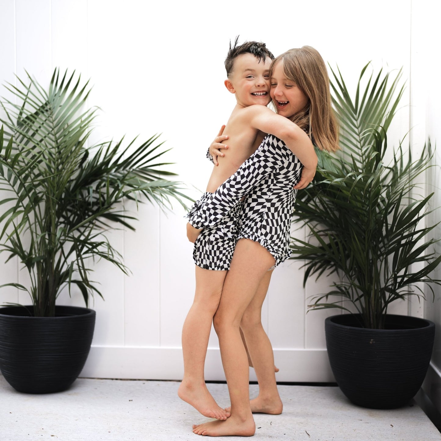 RUFFLE RASH GUARD - Black Dizzy Check - Tenth & Pine - Ruffle Rash Guard - 6/12m - millie + roo