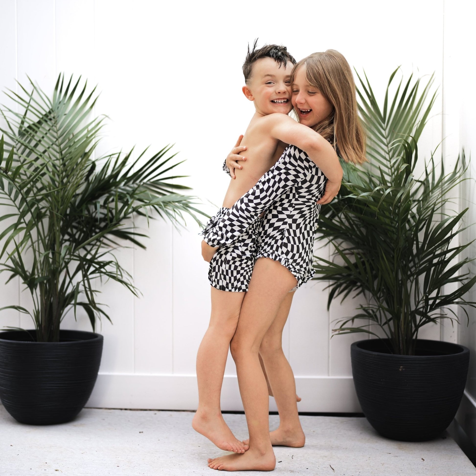 RUFFLE RASH GUARD - Black Dizzy Check - Tenth & Pine - Ruffle Rash Guard - 6/12m - millie + roo