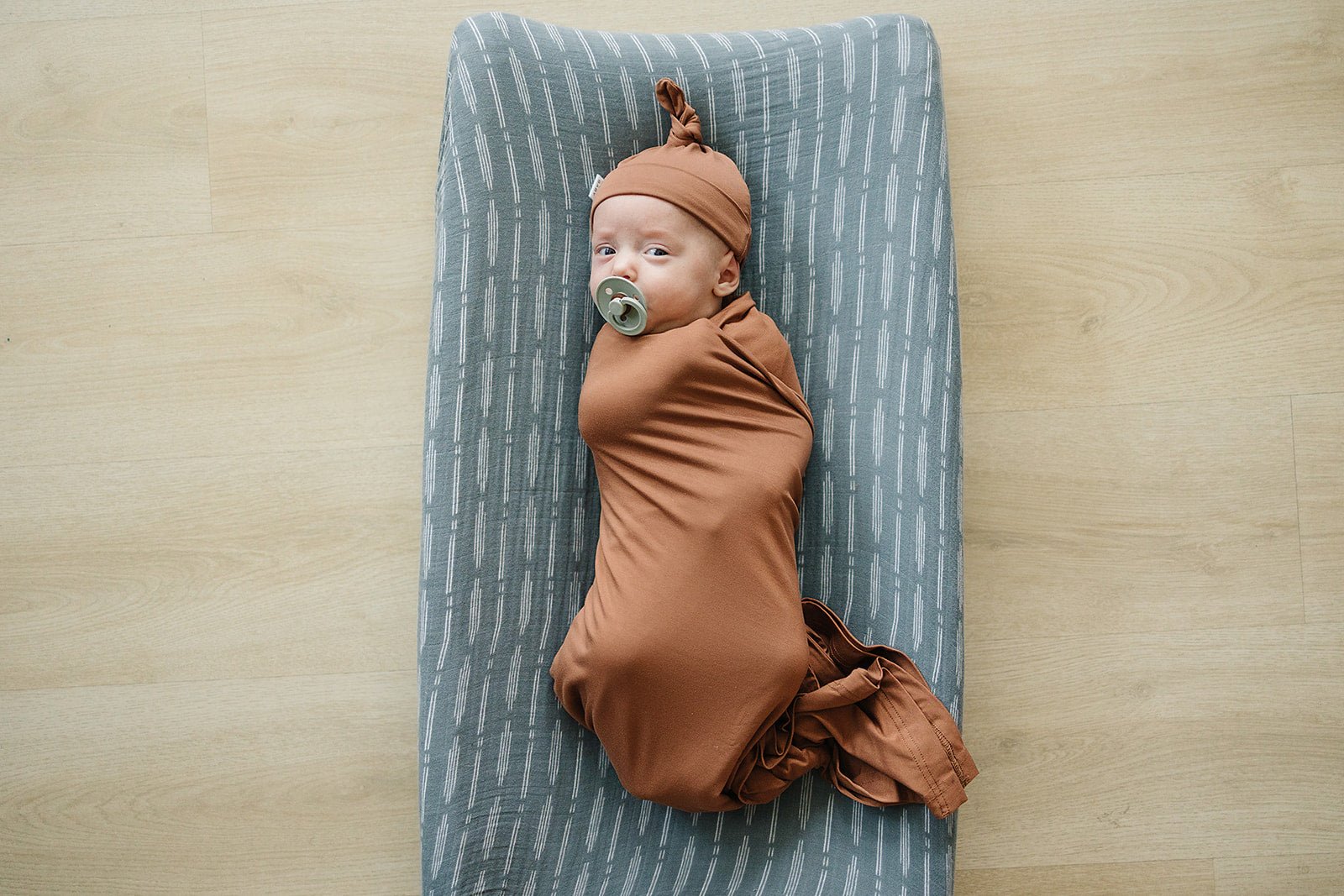 Rust Bamboo Stretch Swaddle - Tenth &amp; Pine - 